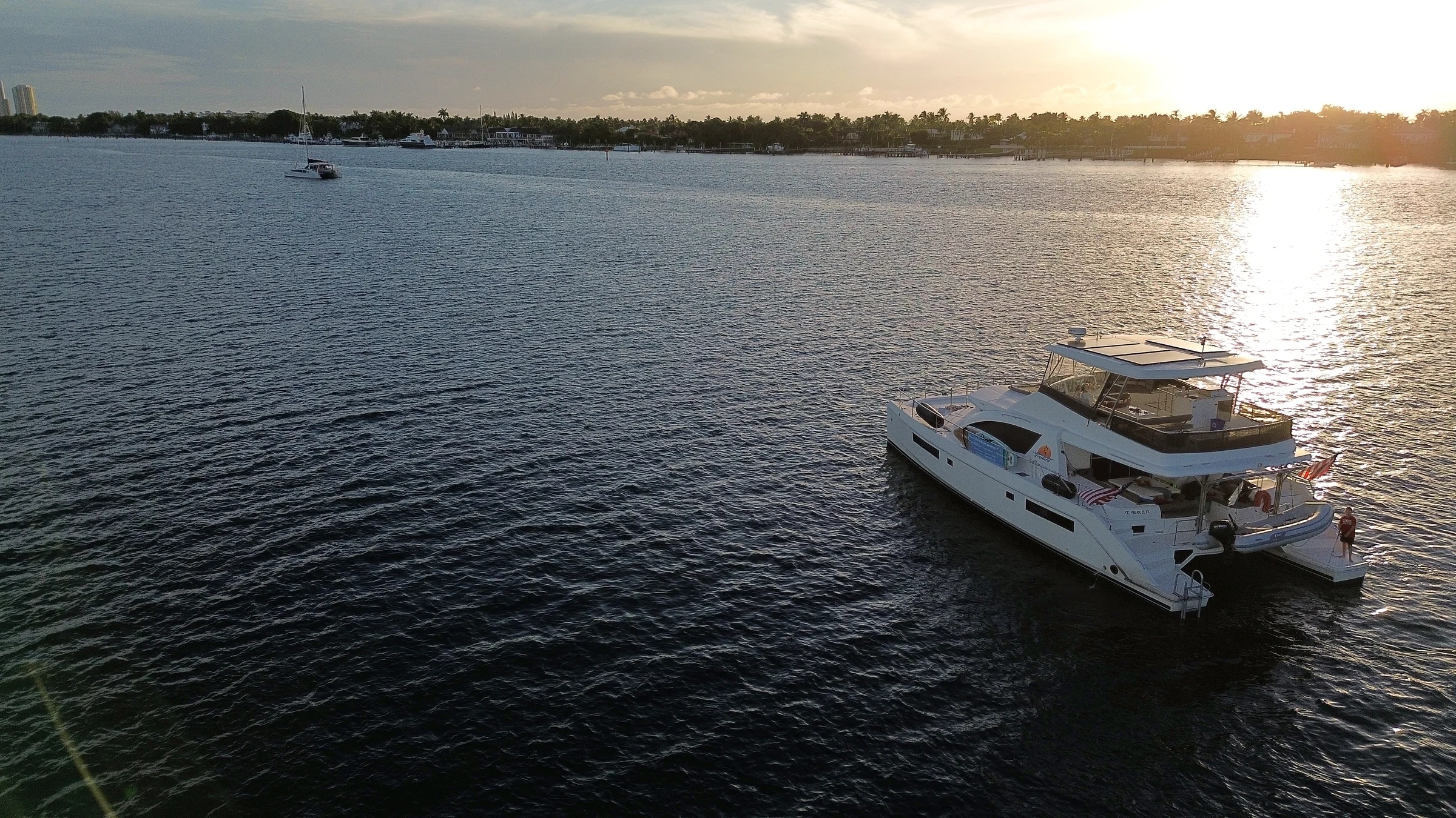 Freebird on the water in warm evening light near sunset