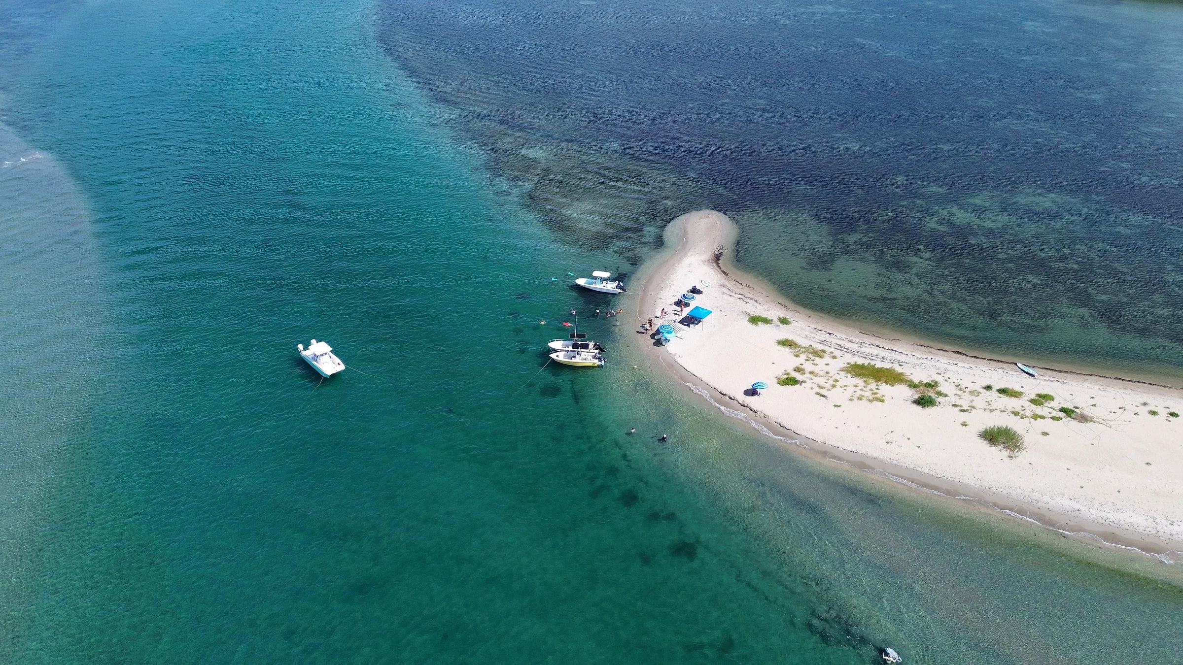 High aerial view of Freebird, shallow water, and a nearby sandbar